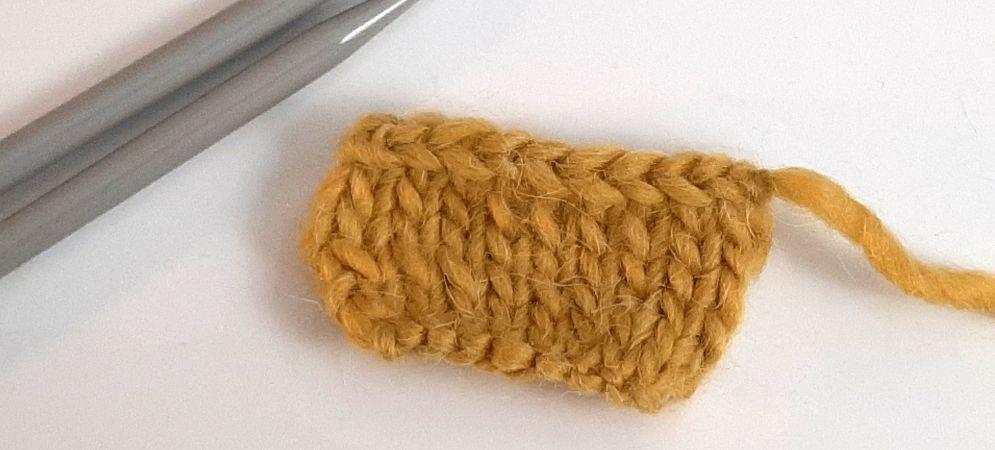 Rabattre les mailles à l'envers